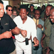 Former world heavyweight champion Muhammad Ali jokes with boxing champion Augustin N’Gou and soldiers upon his arrival in Abidjan, Côte d’Ivoire, Aug. 18, 1997.
Jean-Philippe Ksiazek/AFP/Getty Images